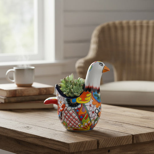 The Talavera Hub large ceramic dove planter, hand-painted with vibrant floral and geometric patterns in blue, orange, yellow, and red.