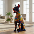 The Talavera Hub large handmade Mexican ceramic dog statue with vibrant hand-painted floral folk art patterns.