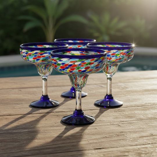 The Talavera Hub Blue Confetti Rock Hand-Blown Margarita Glasses (Set of 4) - Vibrant, unique glassware for cocktails.