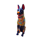 The Talavera Hub handmade Mexican ceramic dog statue with vibrant hand-painted floral patterns and a glossy blue finish.