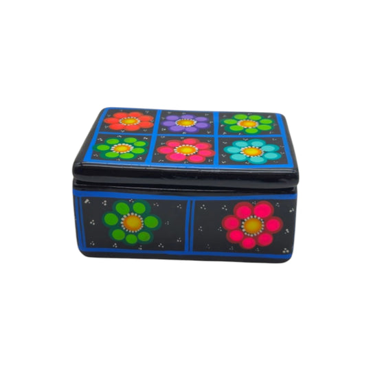 The Talavera Hub handcrafted Mexican ceramic jewelry box with vibrant hand-painted floral patterns on a black base.