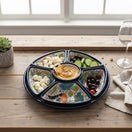 The Talavera Hub blue ceramic sectional appetizer tray with hand-painted birds and floral motifs.