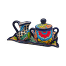 The Talavera Hub 3-piece Mexican pottery coffee set with vibrant hand-painted floral patterns on ceramic