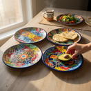 The Talavera Hub 16-piece dinnerware set with vibrant, hand-painted floral Talavera patterns in blue, red, orange, yellow, and green.