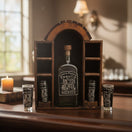 The Talavera Hub Mexican Tequila Decanter Set with 6 shot glasses in a rustic wooden display with carved arch.