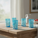 The Talavera Hub Handcrafted Mexican teal and white swirl glass tumblers, 12 oz, lead-free glass.