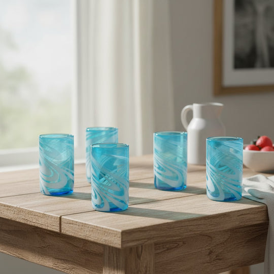 The Talavera Hub Handcrafted Mexican teal and white swirl glass tumblers, 12 oz, lead-free glass.