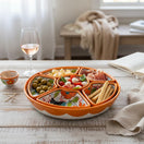 The Talavera Hub orange ceramic appetizer tray with hand-painted birds and floral designs. Divided dish.