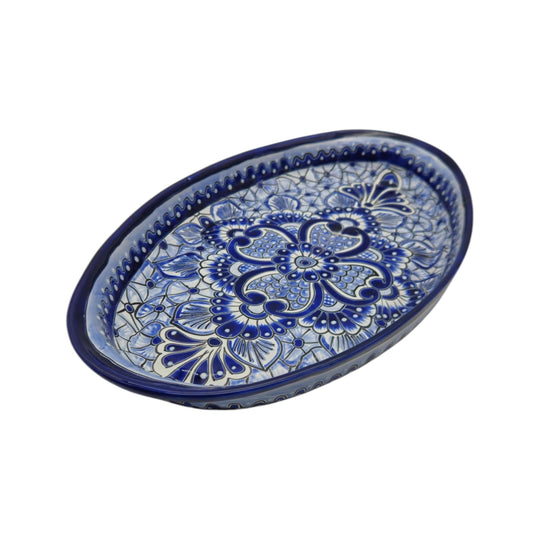 The Talavera Hub oval serving platter featuring intricate hand-painted blue and white Mexican floral patterns.
