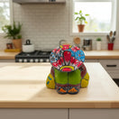 The Talavera Hub handmade Mexican pottery Panchito figurine featuring colorful hand-painted patterns on a kitchen counter