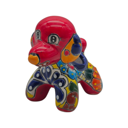 The Talavera Hub handcrafted ceramic poodle planter featuring vibrant hand-painted Mexican folk art patterns.