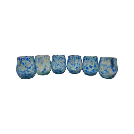 The Talavera Hub hand-blown stemless wine glasses with white and blue snow design. Lead-free glass, 12 oz capacity.