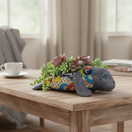 The Talavera Hub medium grey ceramic seal planter with colorful Talavera hand-painted details. Ideal for indoor/outdoor use.