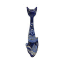 The Talavera Hub tall handmade ceramic cat statue with intricate blue and white floral Mexican folk art patterns.
