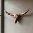 The Talavera Hub handcrafted terracotta longhorn skull wall decor with vibrant hand-painted desert cactus motifs.