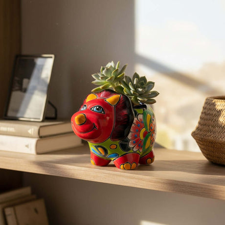 The Talavera Hub handcrafted ceramic triceratops planter with vibrant hand-painted Mexican folk art patterns