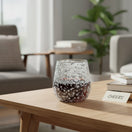 The Talavera Hub white pebbled wine glass, hand-blown from lead-free glass with a frosted pebbled exterior. Holds 12 oz.
