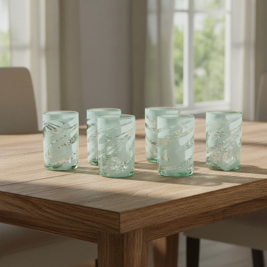 The Talavera Hub white swirl hand-blown Mexican drinking glasses, 18 oz capacity, clear lead-free glass with white swirl pattern.