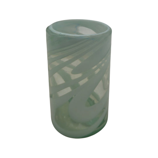 The Talavera Hub hand-blown glass drinking glass with white swirl pattern, 18 oz capacity.