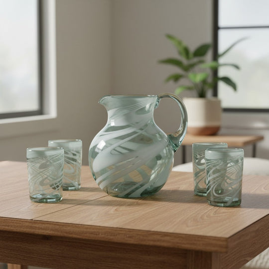 The Talavera Hub white swirl hand-blown Mexican drinking glass pitcher and four glasses. Lead-free glass.