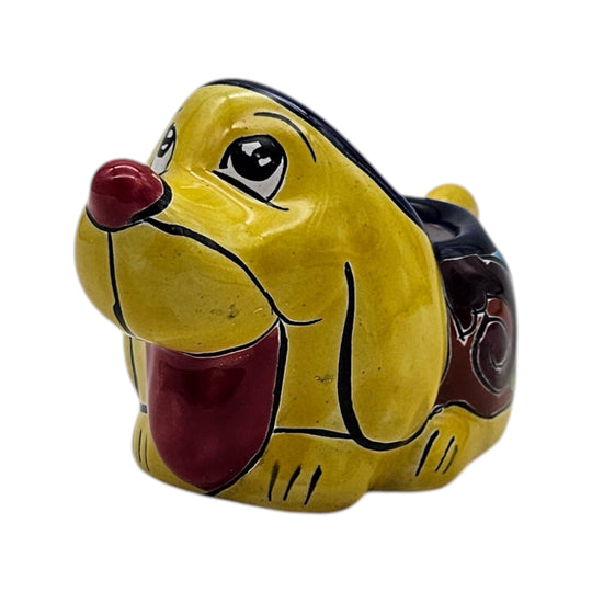 The Talavera Hub small yellow and red hand-painted ceramic dog planter with intricate Mexican pottery patterns.