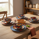 The Talavera Hub 12-piece handmade ceramic dinnerware set with vibrant floral and geometric patterns, cobalt blue rims, and lead-free glaze.