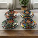 The Talavera Hub 20-piece handmade ceramic dinnerware set with vibrant floral patterns, includes plates and bowls.