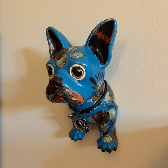 The Talavera Hub blue ceramic French Bulldog statue with floral pattern, handcrafted wall art.
