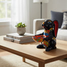 The Talavera Hub dark blue ceramic bunny statue with red ears, holding a colorful Talavera bowl. Handcrafted Mexican folk art.