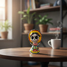 The Talavera Hub Day of the Dead skeleton woman figurine in traditional dress with floral patterns and a wide bonnet.