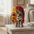 The Talavera Hub Day of the Dead skull planter with sunflowers, hand-painted ceramic with lead-free glaze.