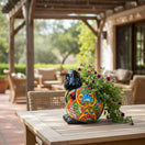 The Talavera Hub handmade fat cat planter, black head with colorful floral Talavera patterns, ceramic pottery.