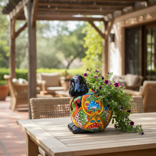 The Talavera Hub handmade fat cat planter, black head with colorful floral Talavera patterns, ceramic pottery.