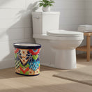 The Talavera Hub handmade oval ceramic trash can with vibrant floral Talavera patterns in blue, red, orange, and green.