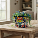 The Talavera Hub hand-painted square planter with colorful floral Talavera design. Ceramic pottery.