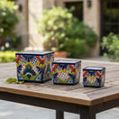 The Talavera Hub set of 3 square ceramic planters, hand-painted with colorful floral Talavera designs.
