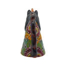 Rear view showing the colorful painted patterns and mane of a unicorn head statue