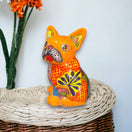 Vibrant Handcrafted Talavera French Bulldog Statue | Unique Medium Dog Sculpture - hand-painted orange Talavera French bulldog on woven basket
