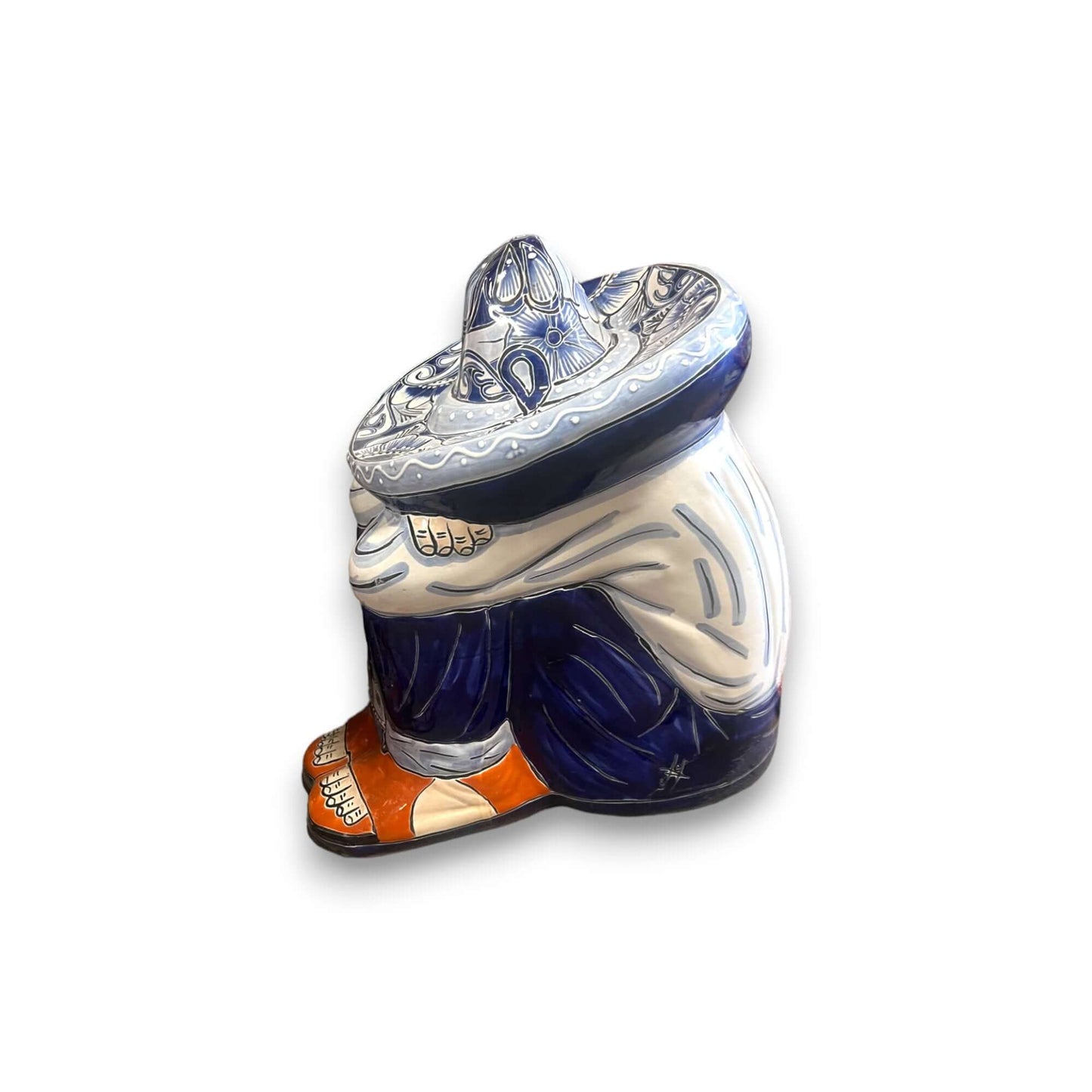 Talavera Panchito Sleeping Man Figurine | XL Hand-Painted Art large hand-painted Talavera statue of a sleeping man in sombrero, earthy blue and orange tones